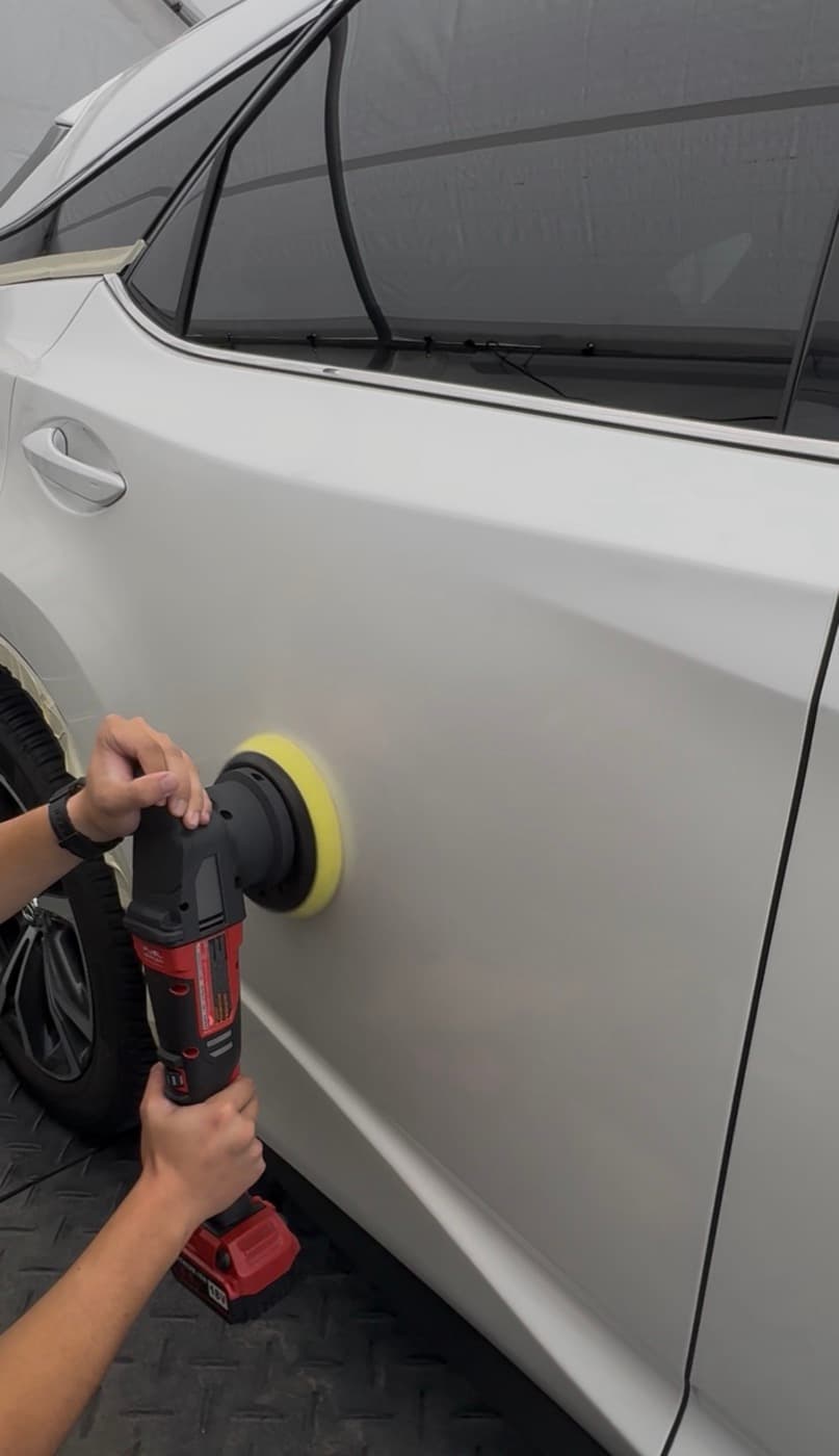 Machine polishing a Lexus